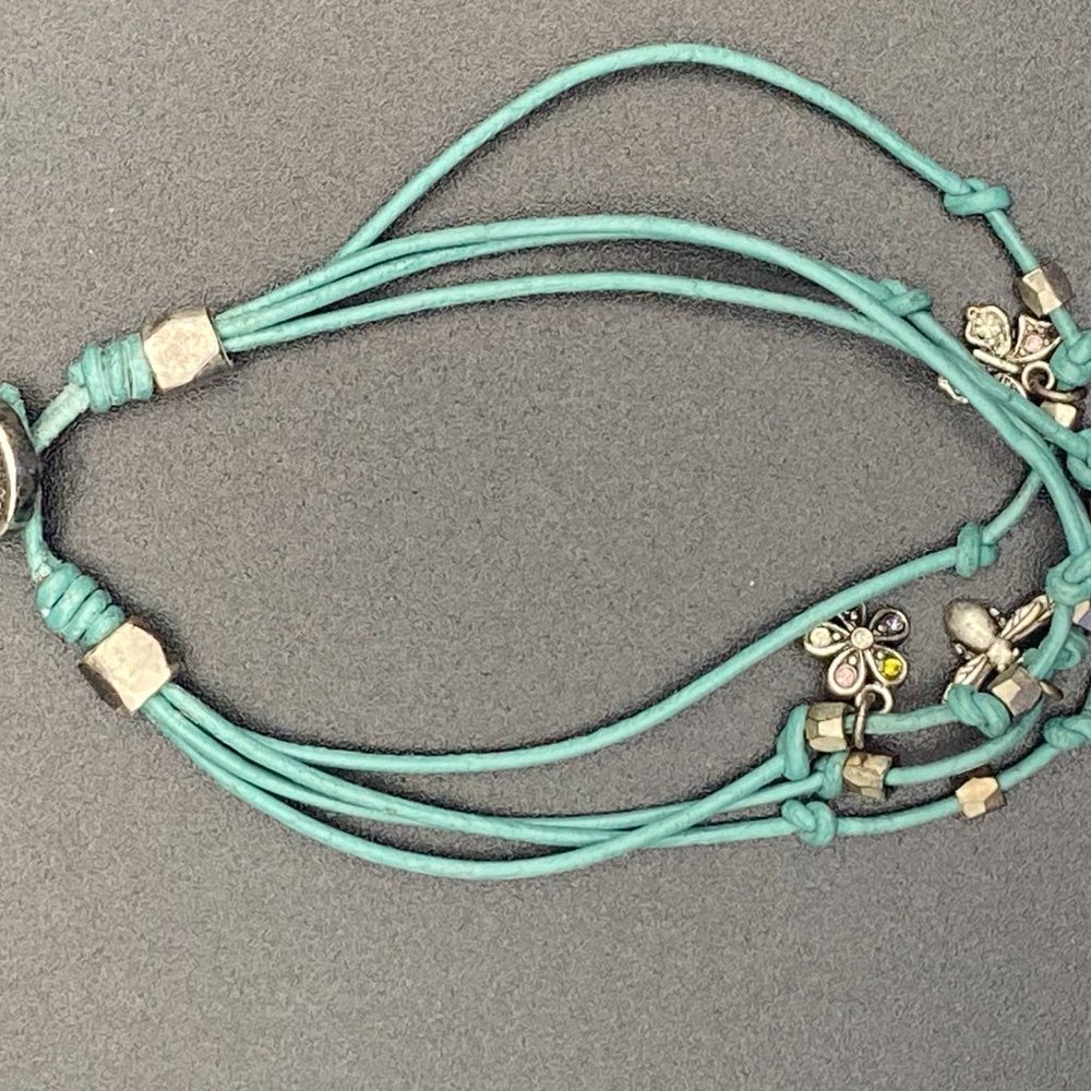 Fossil Multi-Strand Bracelet with Butterfly, Bird, Bee, and Flower Charms